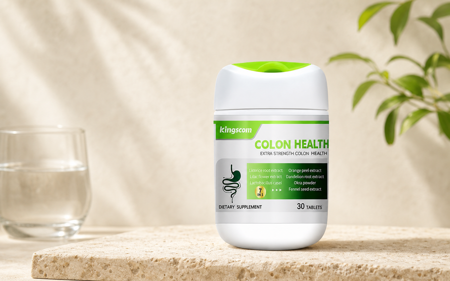Kingscom Colon Health bottle in a warm wellness setting with a glass of water